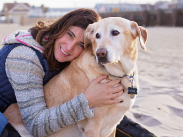 Woman with dog at Bradley Beach, NJ