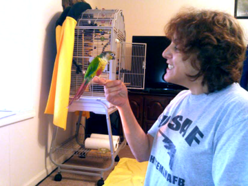 Jill Cat Sitter with Skipper small Parrot