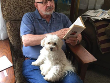 Dwain and Focus, our Maltese dog