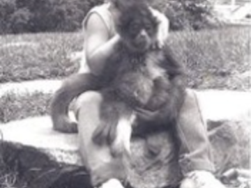 Me at age 3 with our spider monkey, Oompah! 