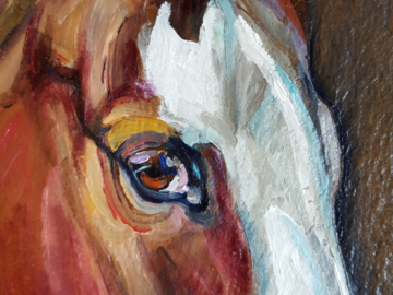 close up of horse painting on slate