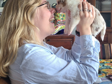 Loving up on one of Bluegrass Kennel's puppies