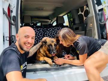 The Pet Taxi® getting to know their pet passenger, Tara.