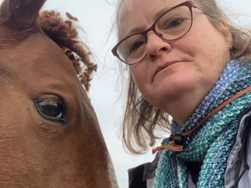 Alison Stanton talks with a horse