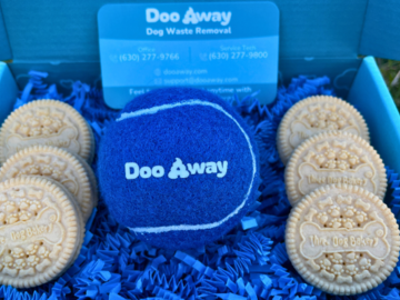 Dog cookies and Doo Away tennis ball in our welcome box