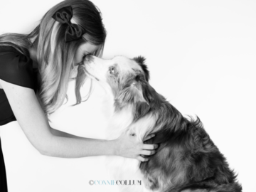 Young woman with Australian Shepherd