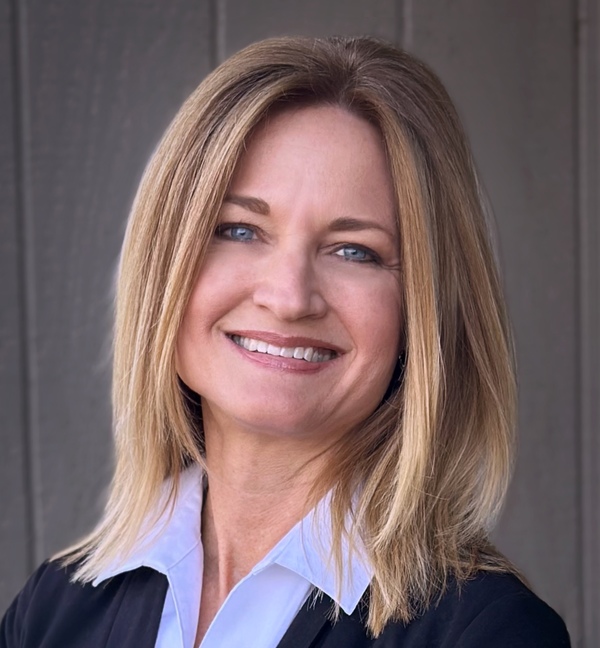 Headshot   black jacket  upper body   right side